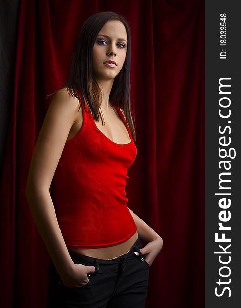 Attractive young girl in red shirt