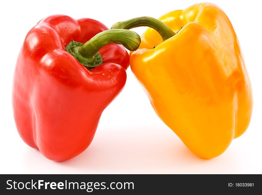 Yellow peppers and red isolated on white background. Yellow peppers and red isolated on white background