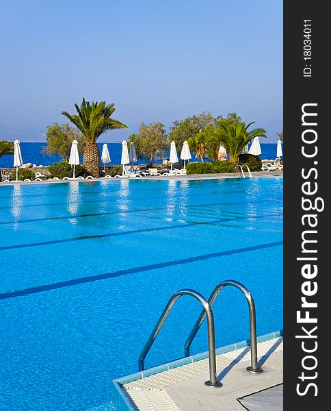 Water pool and stairs - vacation background