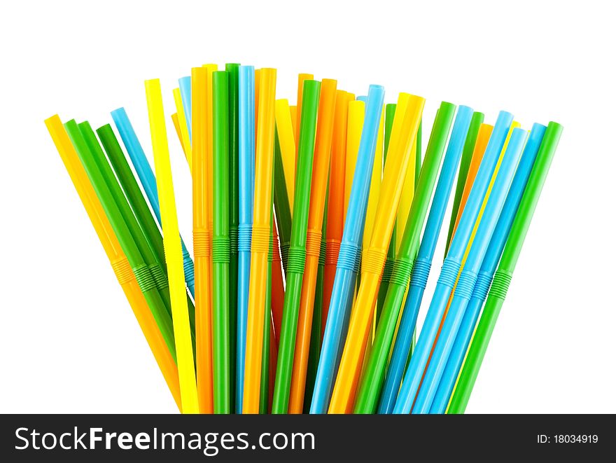 Colorful cocktail straws against a white background