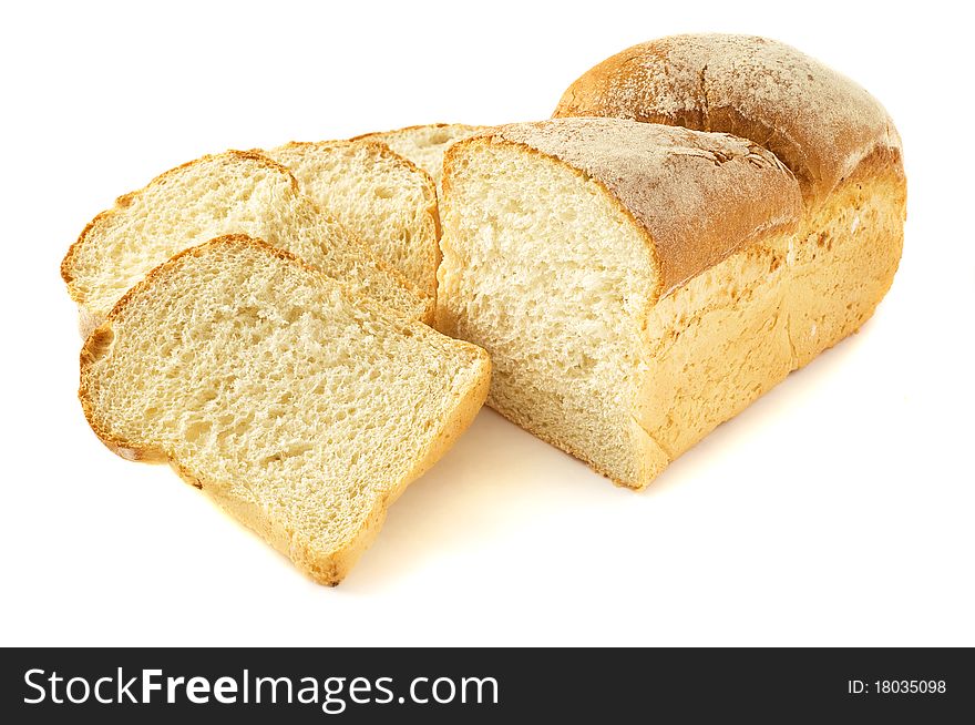 Sliced wheaten bread isolated on the white. Sliced wheaten bread isolated on the white