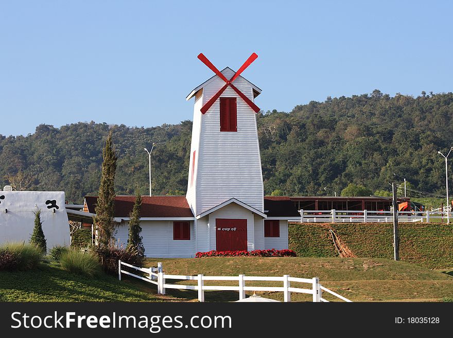 Windmill on a white building