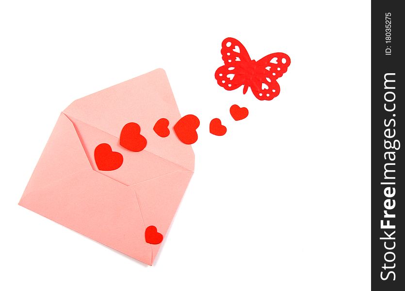 Red heart and butterfly in the pink paper envelope. Red heart and butterfly in the pink paper envelope