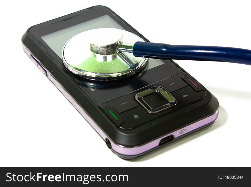 Stethoscope and cellphone isolated on the white background