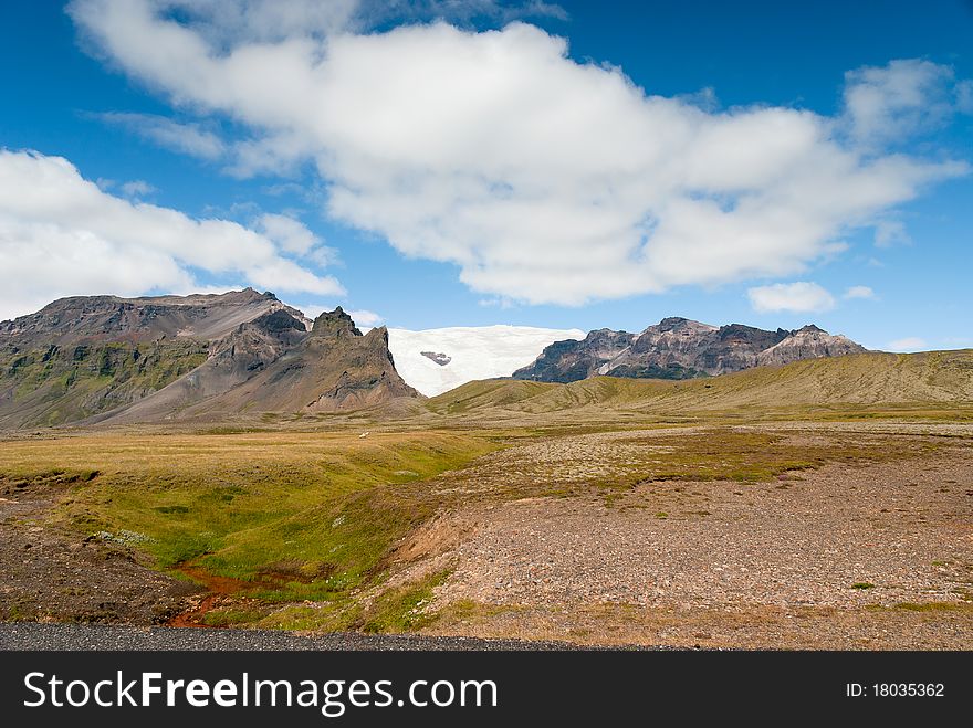 Landscape with glacier in Iceland in the background. Landscape with glacier in Iceland in the background