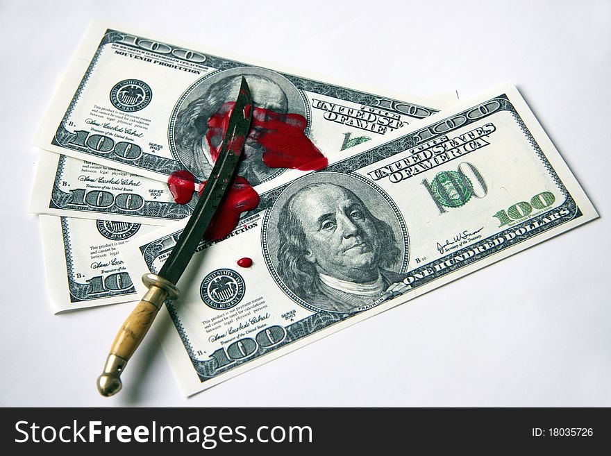 Japanese dagger, dollars and blood puddle. Japanese dagger, dollars and blood puddle