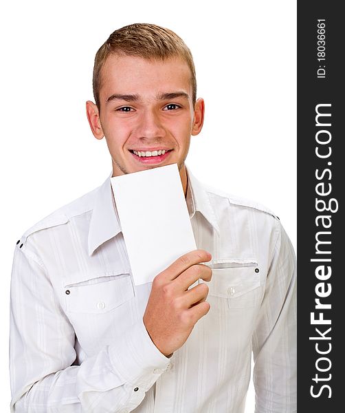 Portrait of a happy young man holding a blank board for texting against white