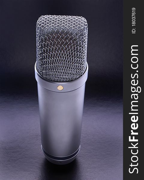 Studio microphone for recording on a white background