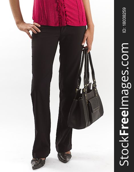 Lower body of a confident career business woman in elegant clothes with a leather handbag. Lower body of a confident career business woman in elegant clothes with a leather handbag