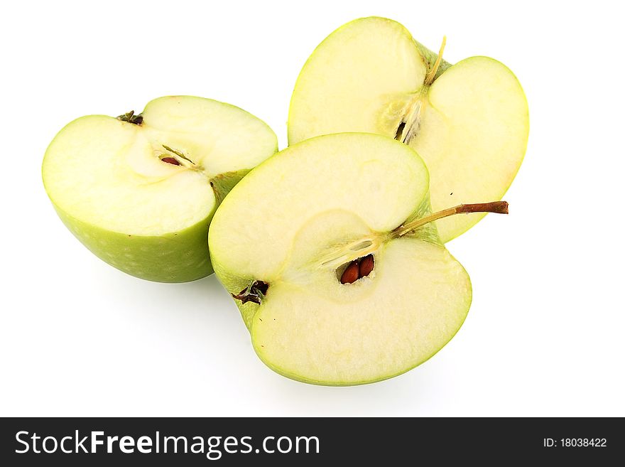 Cutted green apples on white
