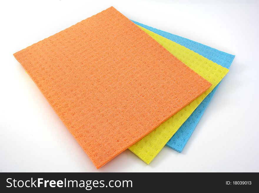 Colorful cloth for cleaning on a white background. Colorful cloth for cleaning on a white background