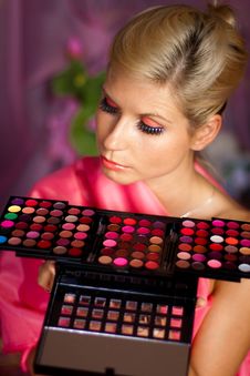 Beautiful Girl With Set Of Lipsticks For Make-up Royalty Free Stock Photos