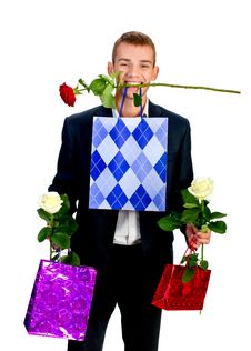 Young Man With Rose And Shopping Bag Royalty Free Stock Photo