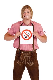 Smiling Bavarian Man Holds Non-smoking-rule Sign Royalty Free Stock Images Smiling Bavarian Man Holds Non-smoking-rule Sign Royalty Free Stock Images