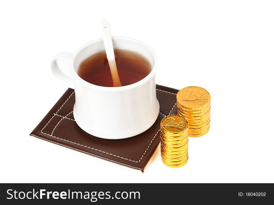 A cup of tea with money-sweets. A cup of tea with money-sweets.