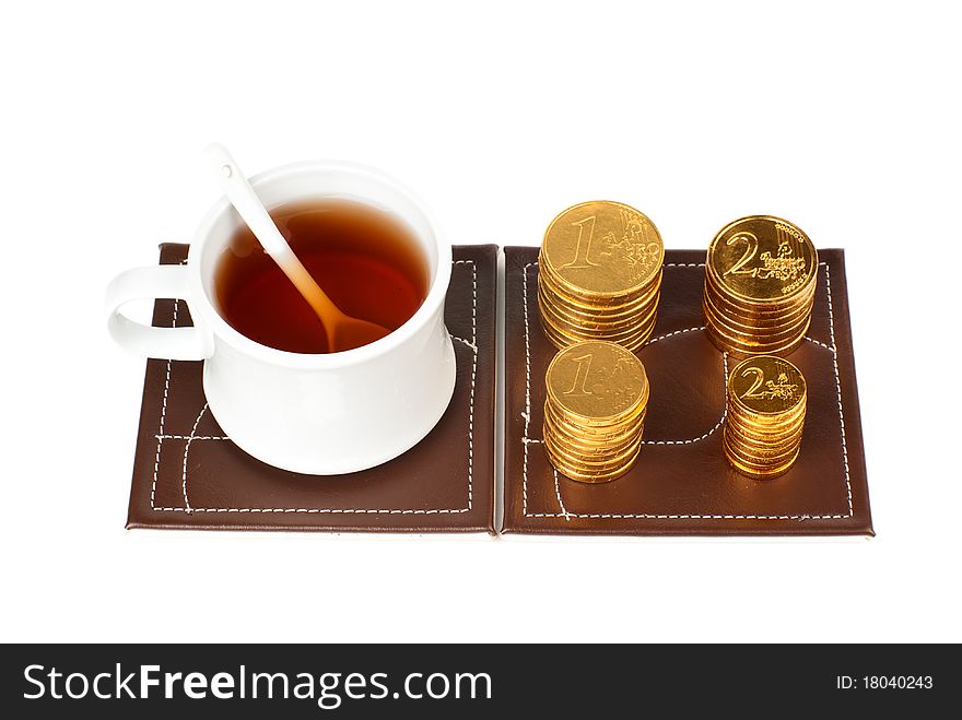 A cup of tea with money-sweets. A cup of tea with money-sweets.