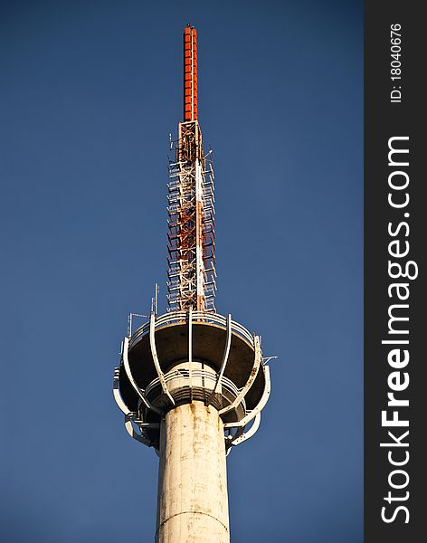 Huge communication antenna tower against  sky. Huge communication antenna tower against  sky.