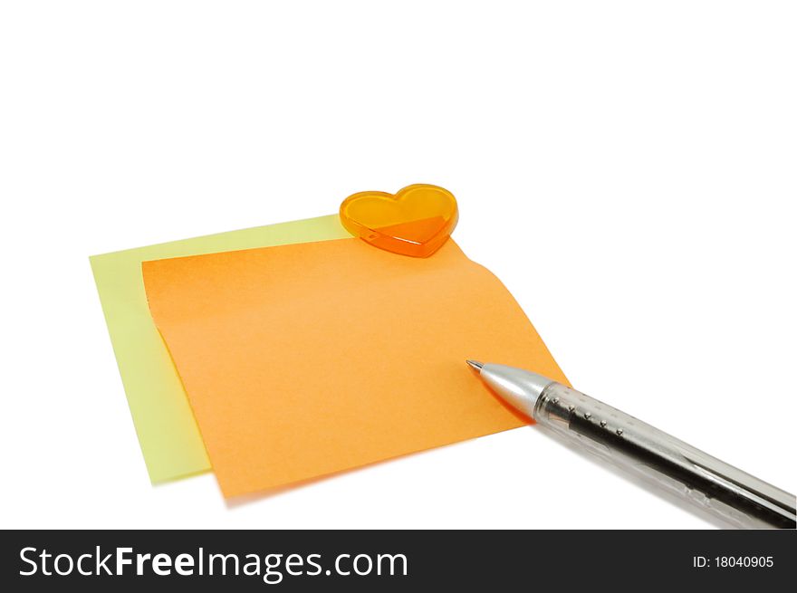 Multi-colored paper with the handle and a heart are isolated on a white background. Multi-colored paper with the handle and a heart are isolated on a white background