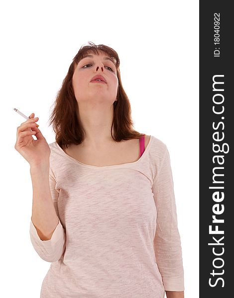 A young woman has a cigarette in her hand. A young woman has a cigarette in her hand