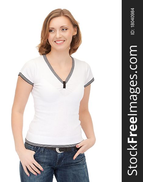 Portrait of attractive smiling woman in white blouse and jeans isolated on white