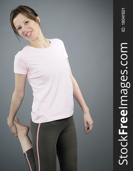 Happy white woman learning aerobic exercises. Happy white woman learning aerobic exercises