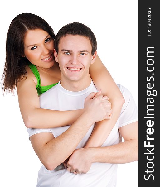 Beautiful young couple on a white background