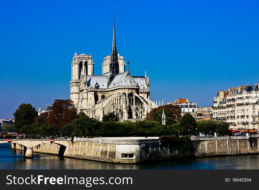 Notre Dame in Paris on a September day with a flawless blue sky. Notre Dame in Paris on a September day with a flawless blue sky.