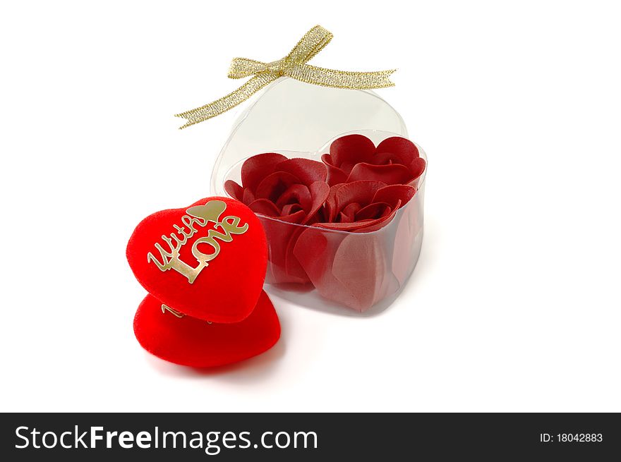 Two hearts and box with roses it is isolated on a white background