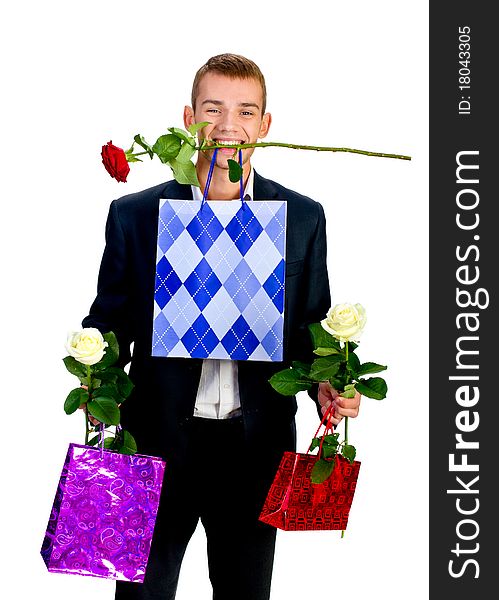 Young Man With Rose and shopping bag  isolated on white