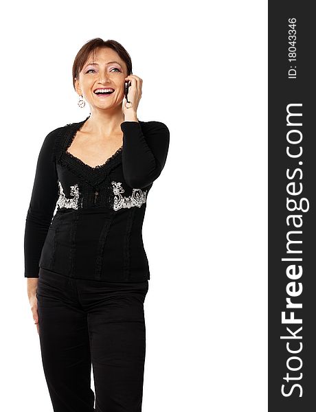 Mature woman in lace jacket tell on cell phone and smile. Mature woman in lace jacket tell on cell phone and smile