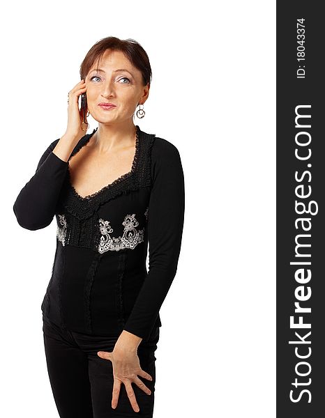 Mature woman in lace jacket tell on cell phone and smile. Mature woman in lace jacket tell on cell phone and smile