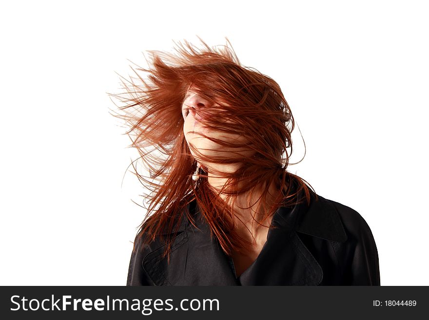 An red haired girl having fun by weaving her hair. An red haired girl having fun by weaving her hair