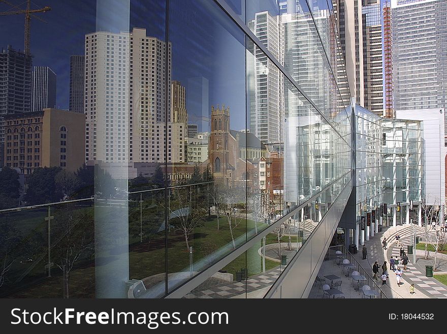 Yerba Buena Gardens and adjacent buildings are reflected off the windows of the Metreon Building in San Francisco. Yerba Buena Gardens and adjacent buildings are reflected off the windows of the Metreon Building in San Francisco