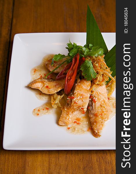 Grilled salmon with Thai style spicy chlli sauce. Grilled salmon with Thai style spicy chlli sauce