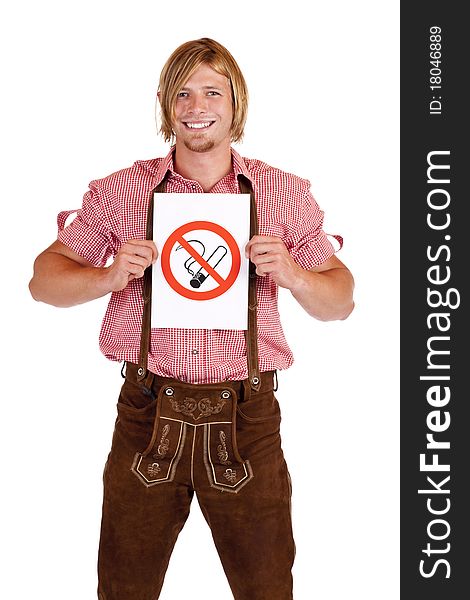 Smiling Bavarian man in lederhose holds non-smoking-rule sign. Isolated on white background. Smiling Bavarian man in lederhose holds non-smoking-rule sign. Isolated on white background.