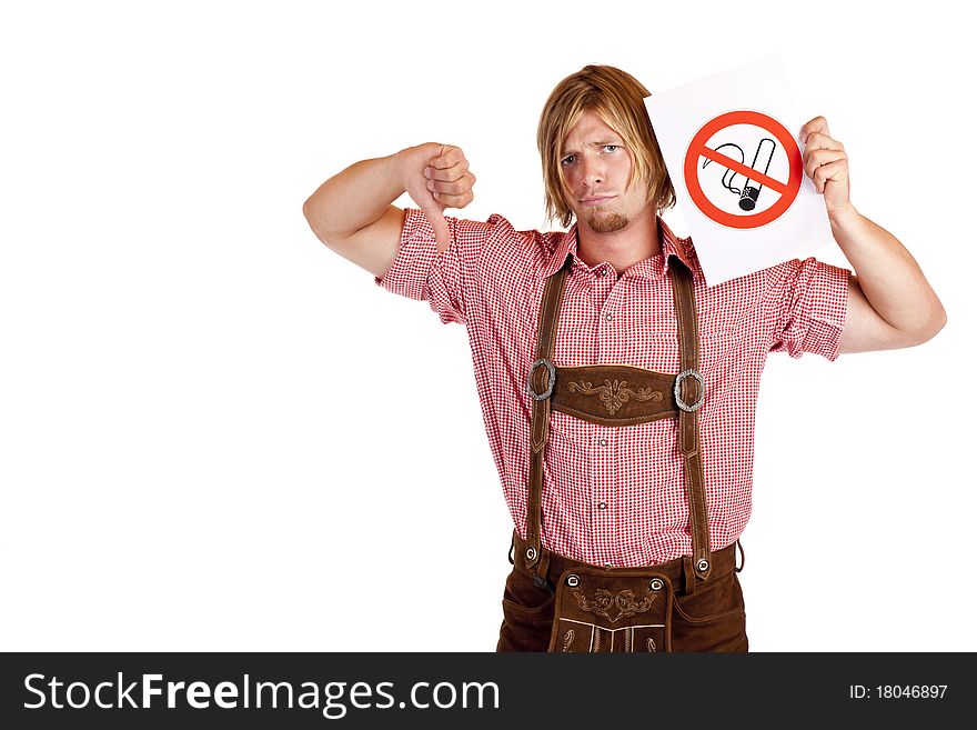 Bavarian man in lederhose disagrees to non-smoking-rule. Isolated on white background.