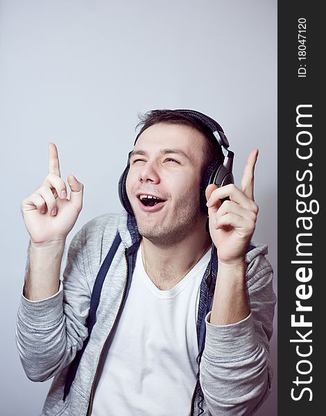 Guy in headphones listens to music