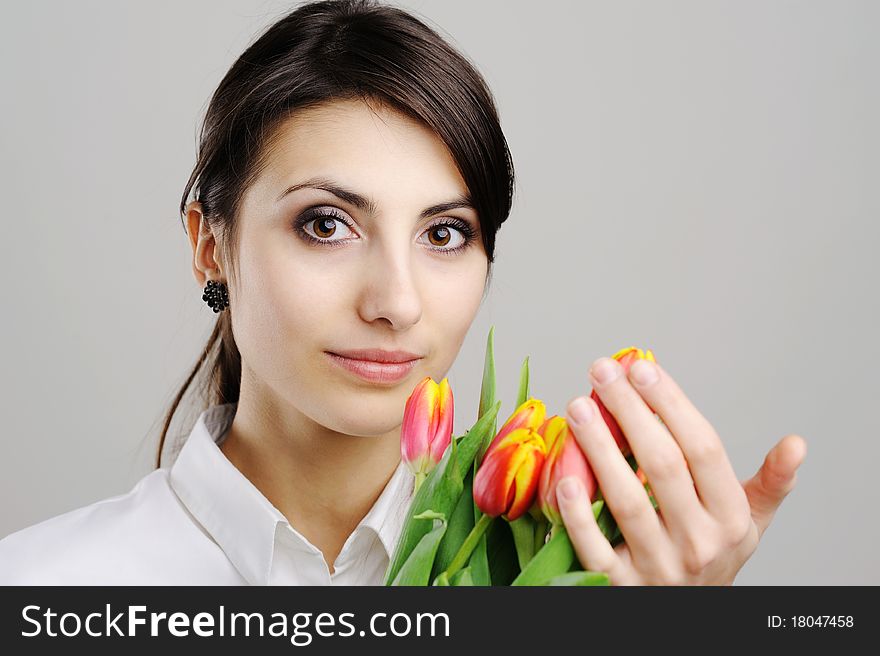 An image of woman with tulip flowers. An image of woman with tulip flowers