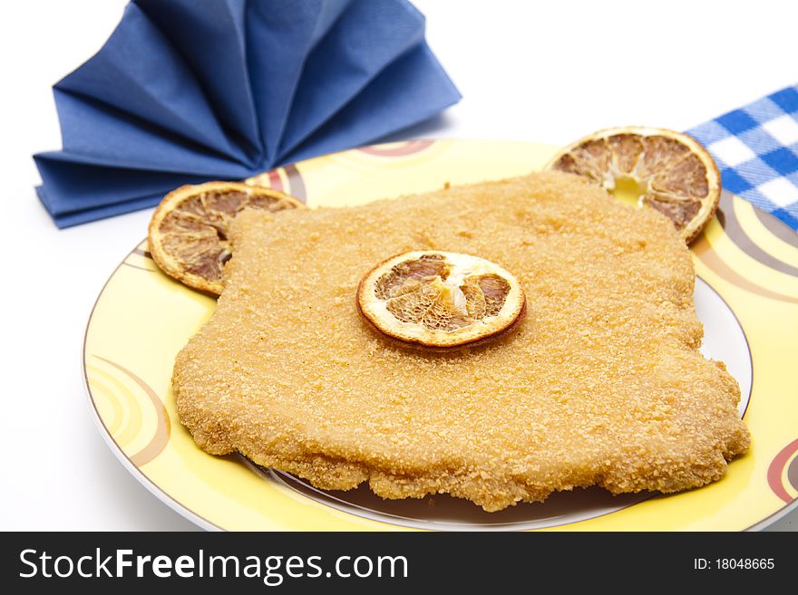 Escalope raw with lemon and napkin