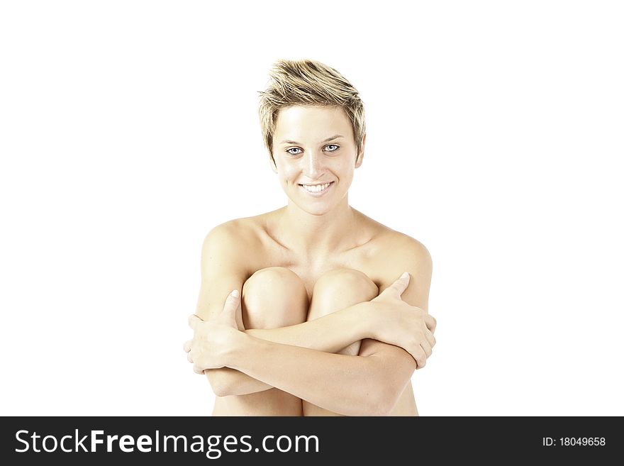 Naked blonde girl on white background