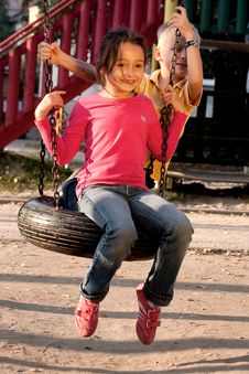 Boy And Girl On Swing Stock Images Boy And Girl On Swing Stock Images