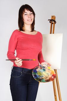 Girl Standing Near Easel, Holding Palette Stock Photos