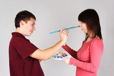 Man Touching Nose Of Young Girl By Brush Royalty Free Stock Images