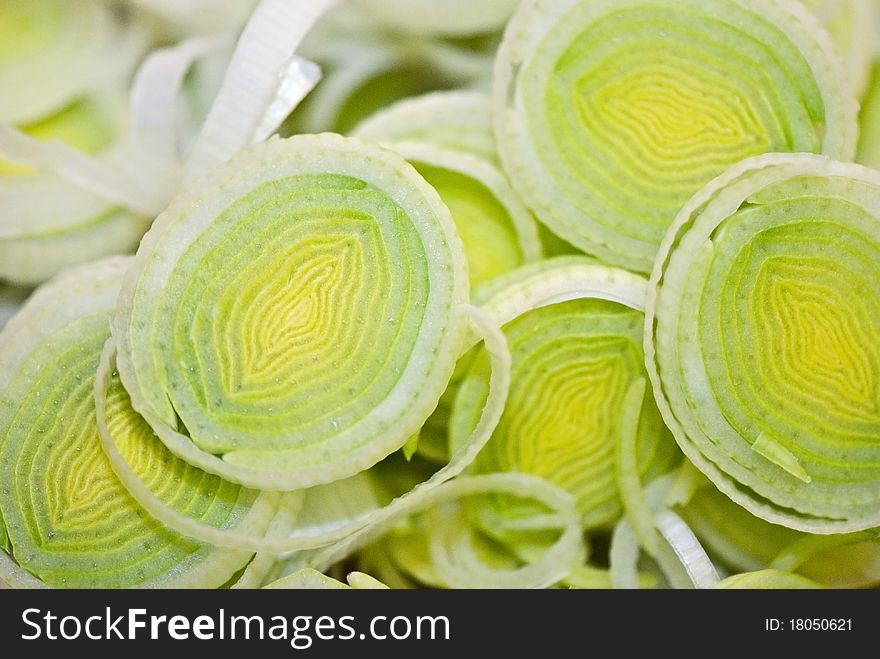 Slices of a green leek closeup