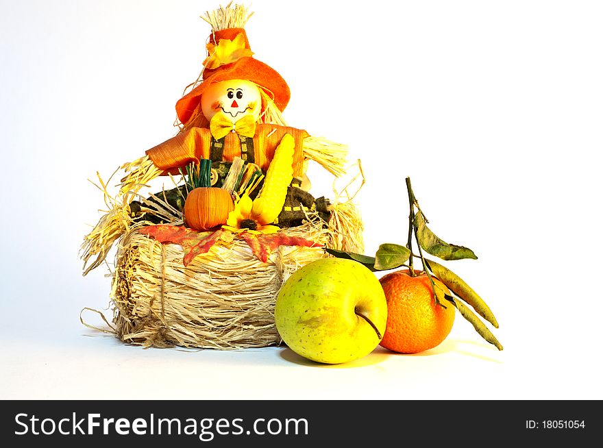 A nice halloween toy with fruits near