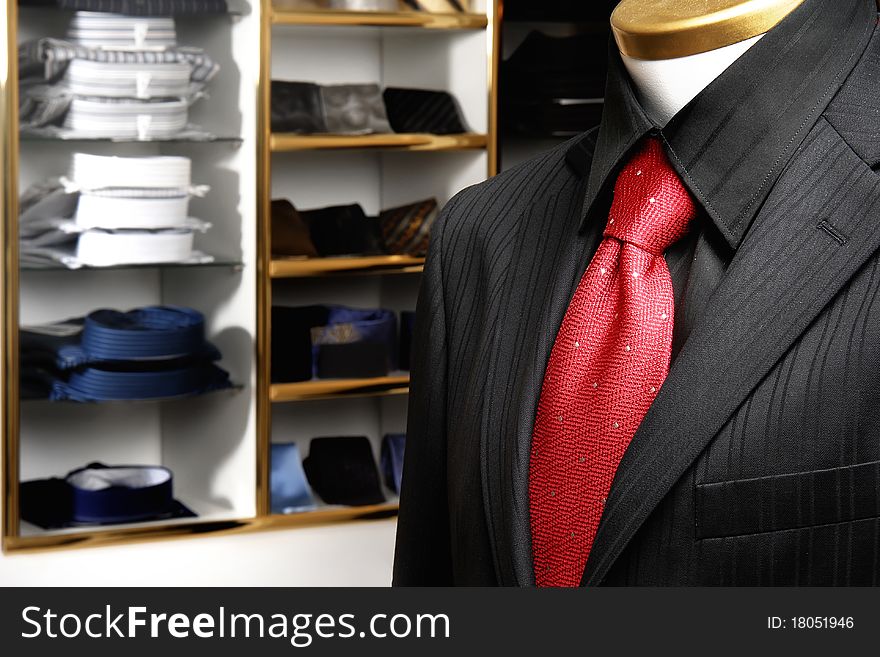 Mannequin dressed in a suit with red tie. Mannequin dressed in a suit with red tie