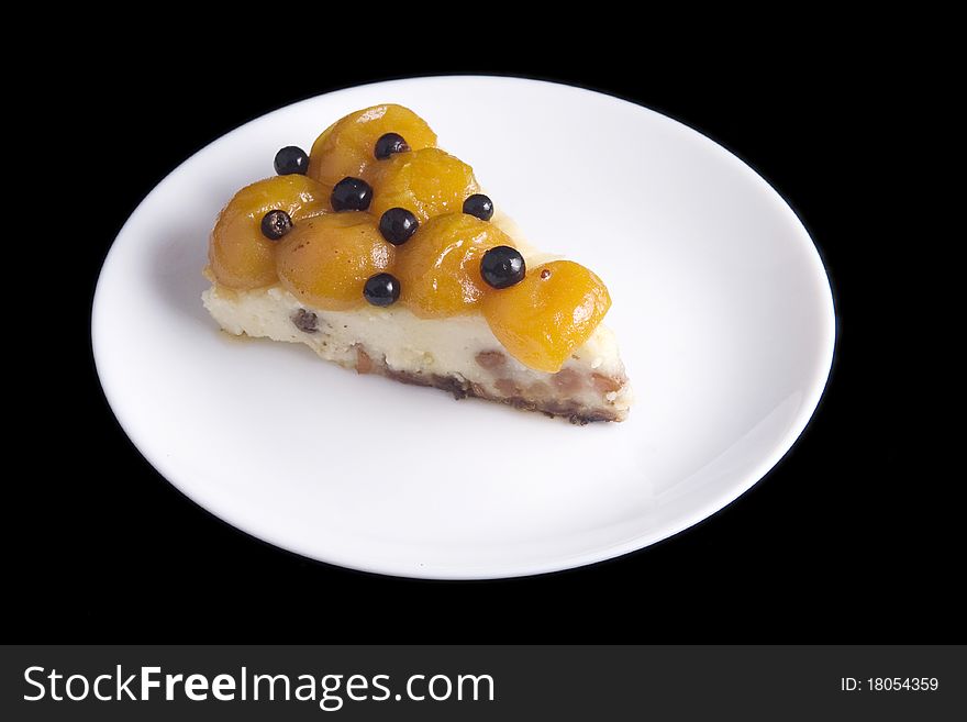 Cottage cheese baked pudding with raisin, apricots and berries