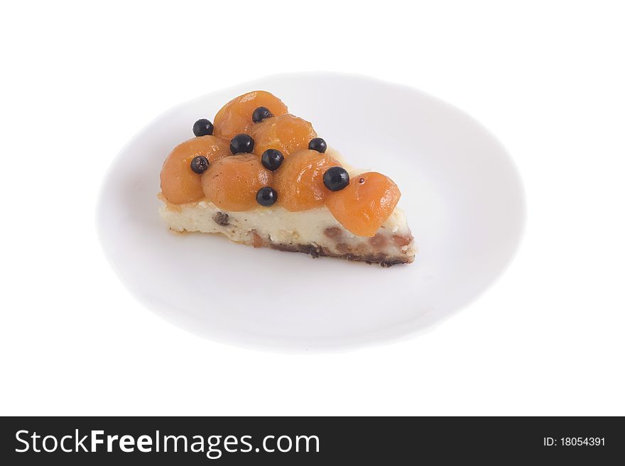 Cottage cheese baked pudding with raisin, apricots and berries