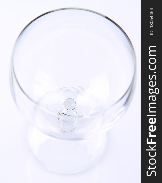 Empty wine glass on white background