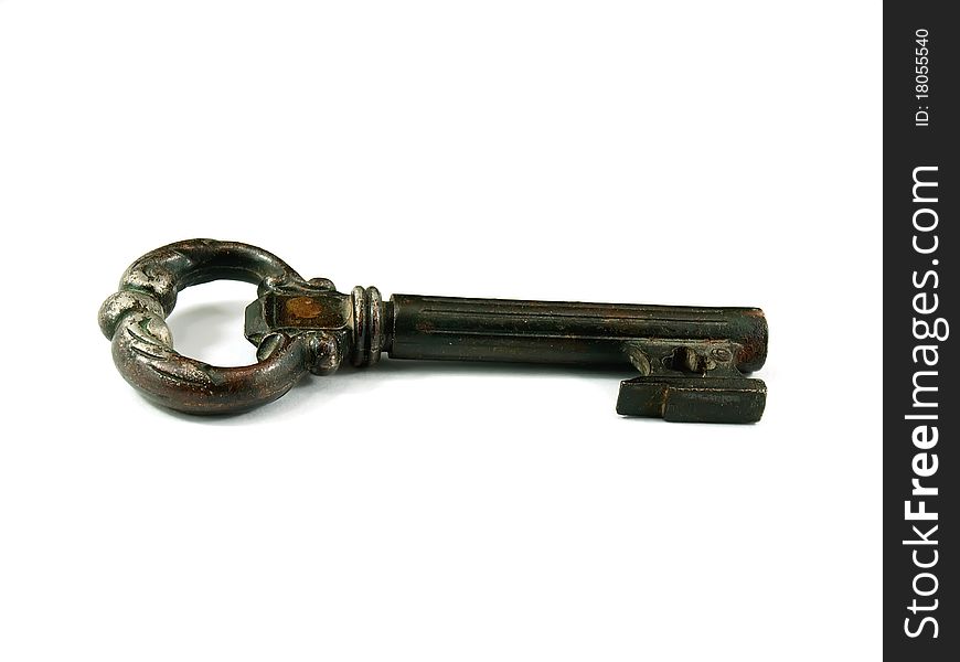 Old metal key isolated on a white background. Old metal key isolated on a white background